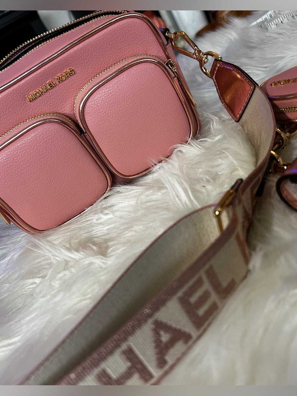 Michael Kors crossbody in primrose / NWT with coin purse and air pod case.